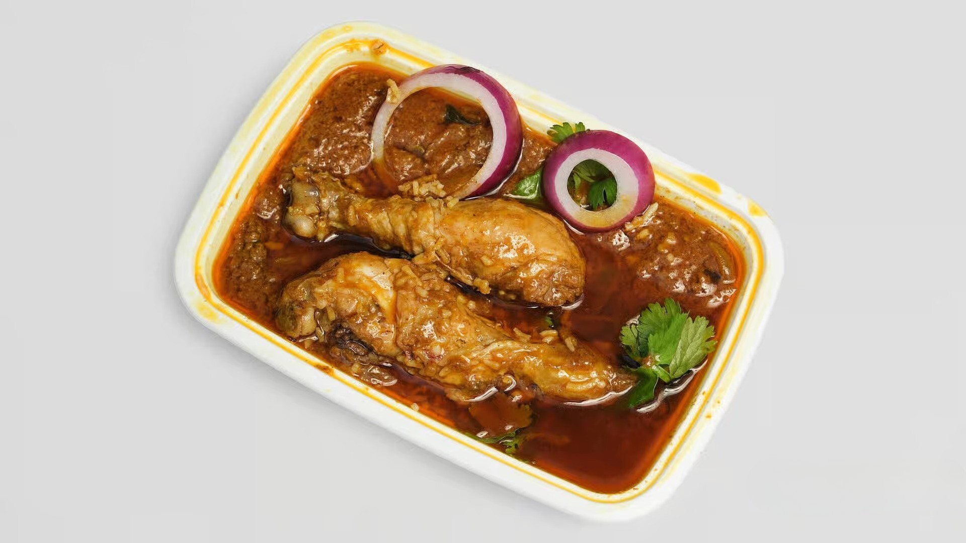 Chicken Curry at Chennai Biryani House - Juicy chicken pieces simmered in a flavorful curry sauce